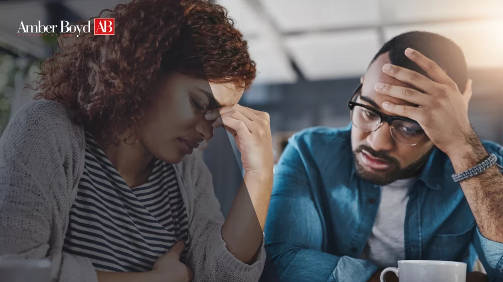 Indiana employee reviewing wrongful termination documents with employment attorney