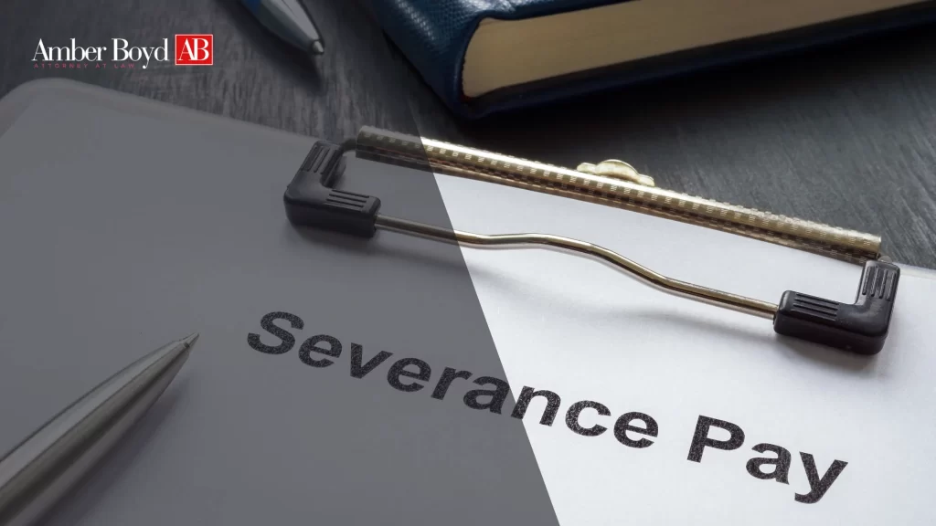 0715 Severance Pay Taxes in Indiana What Youll Actually Take Home 1 - Amber Boy - Amber Boy Indiana tax professional reviewing severance agreement withholding calculations and tax obligations