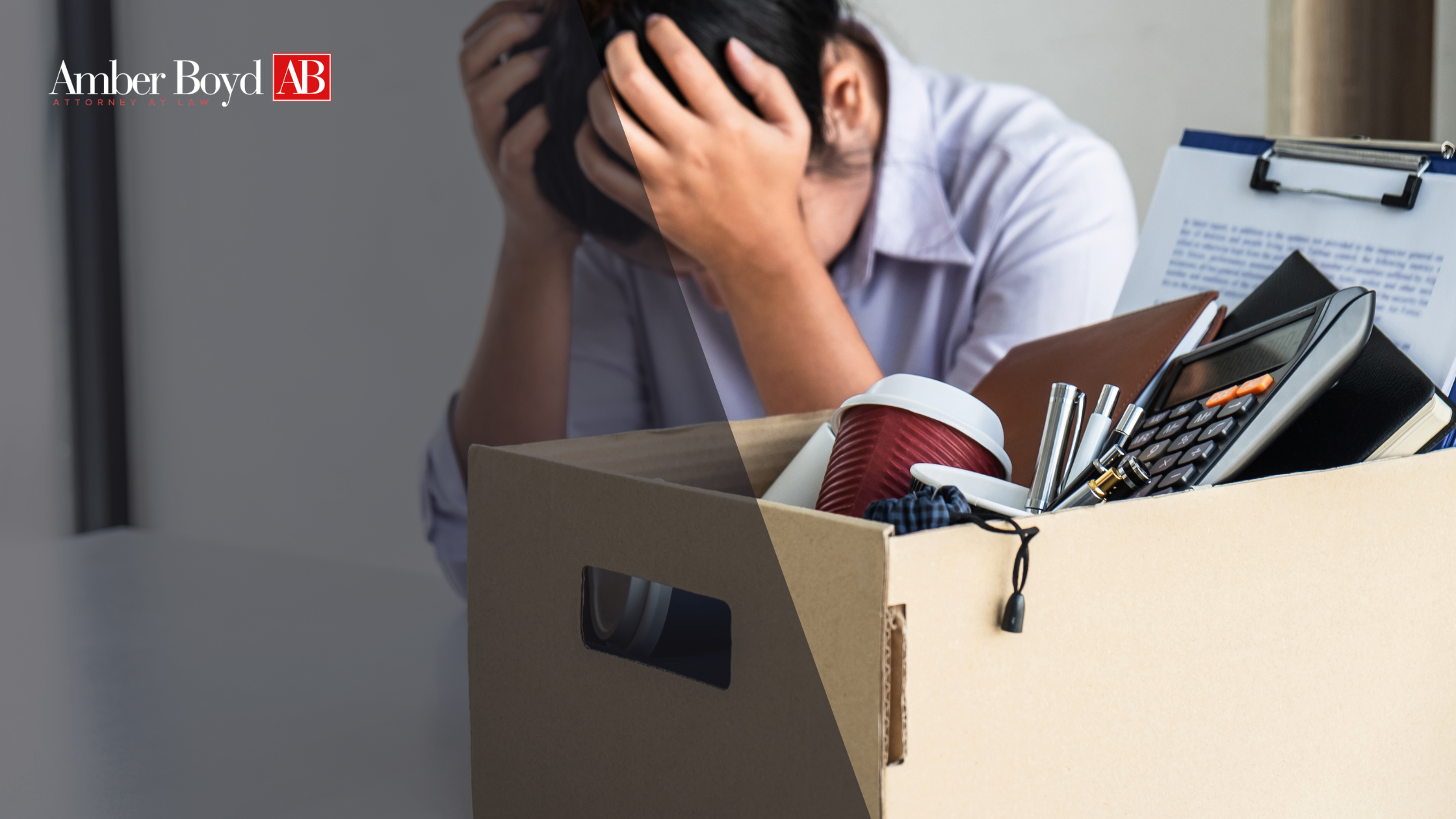 0716 How to Prove Wrongful Termination in Indiana Evidence Checklist 1 stressed person holding head beside a cardboard box of office supplies, with Amber Boyd Attorneys at Law logo in the corner