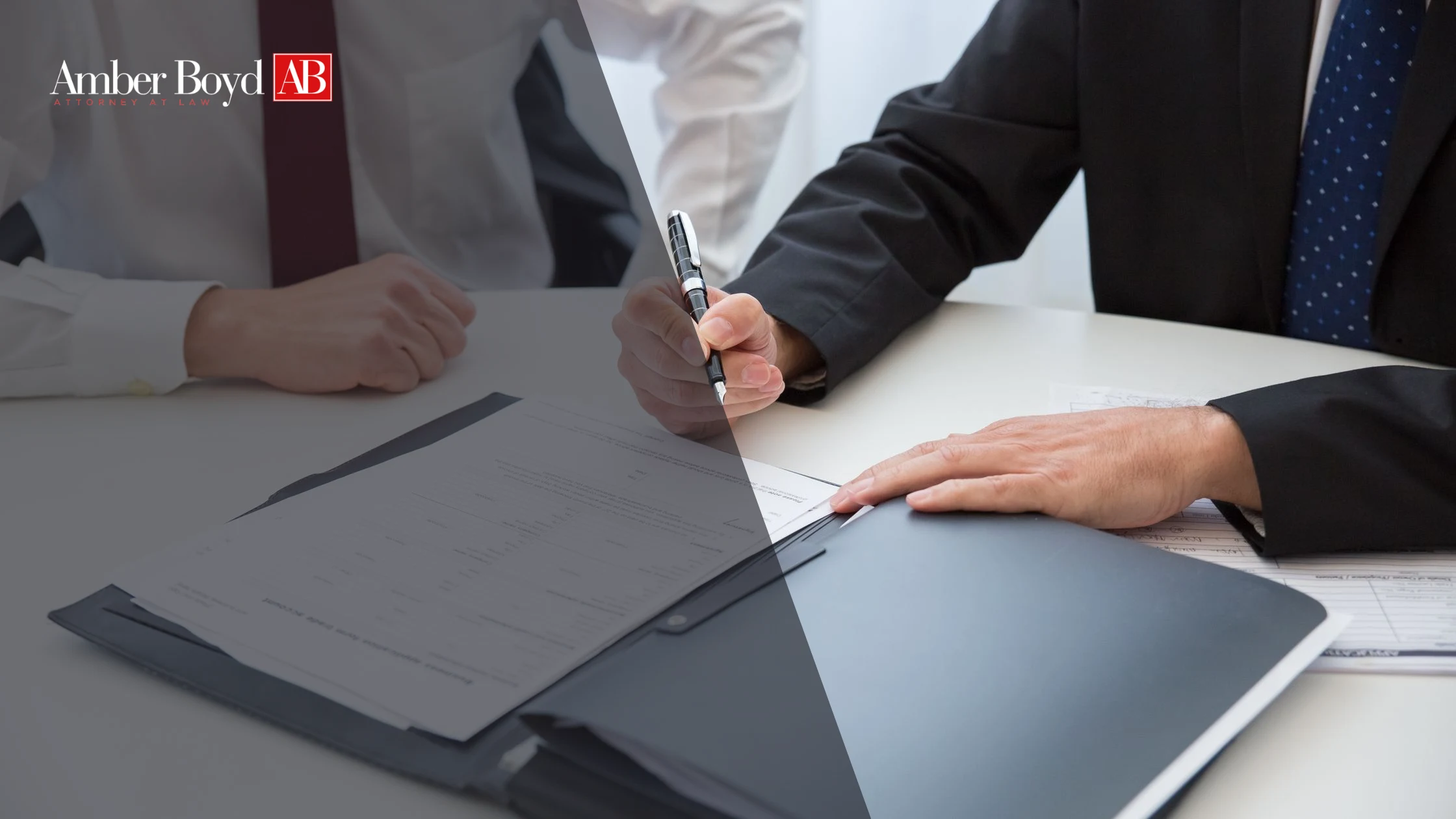 Indiana employee reviewing a signed non-compete agreement with an attorney