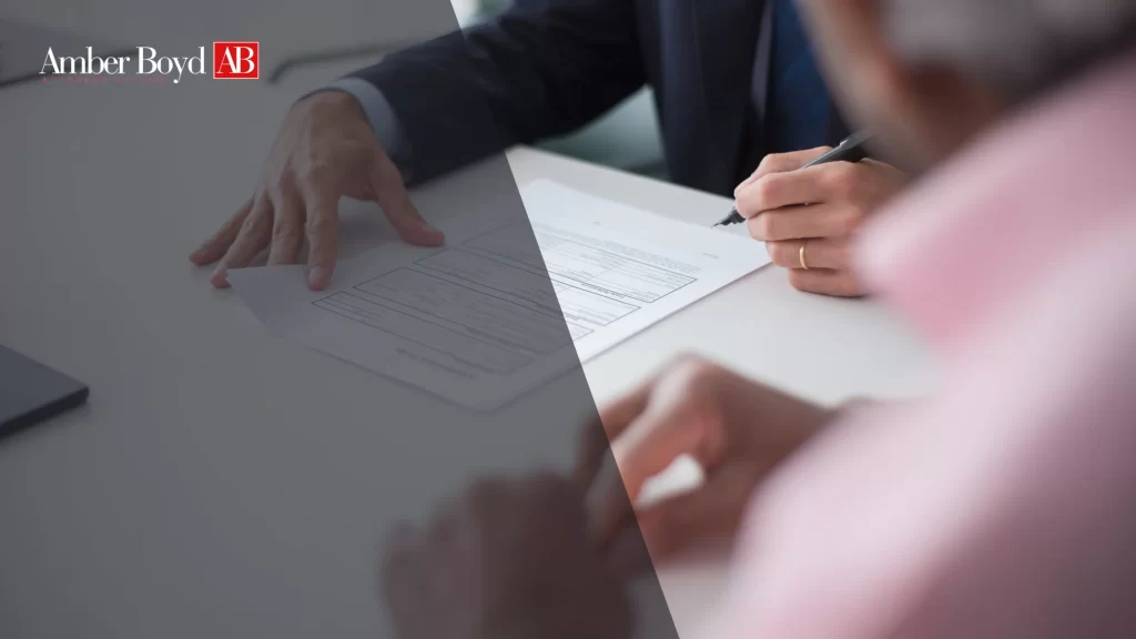 What Is FMLA Leave The 12-Week Federal Right Explained 2 - Amber Boy - Amber Boy Indiana employee reviewing FMLA paperwork explaining the 12-week leave right