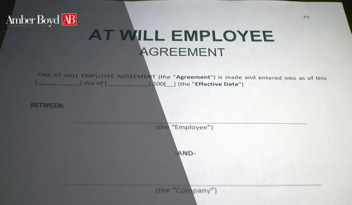 Employment agreement document titled 'AT WILL EMPLOYEE AGREEMENT' with Amber Boyd logo in corner.