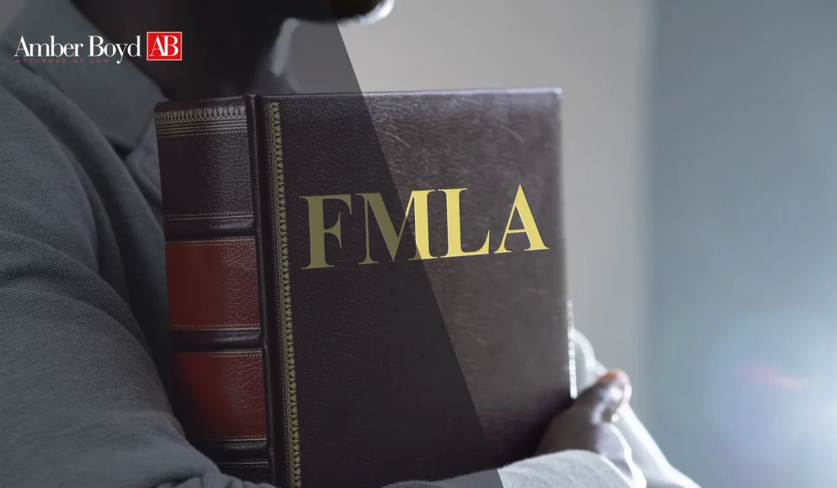 Indiana FMLA retaliation attorney reviewing employment records and leave documentation with employee