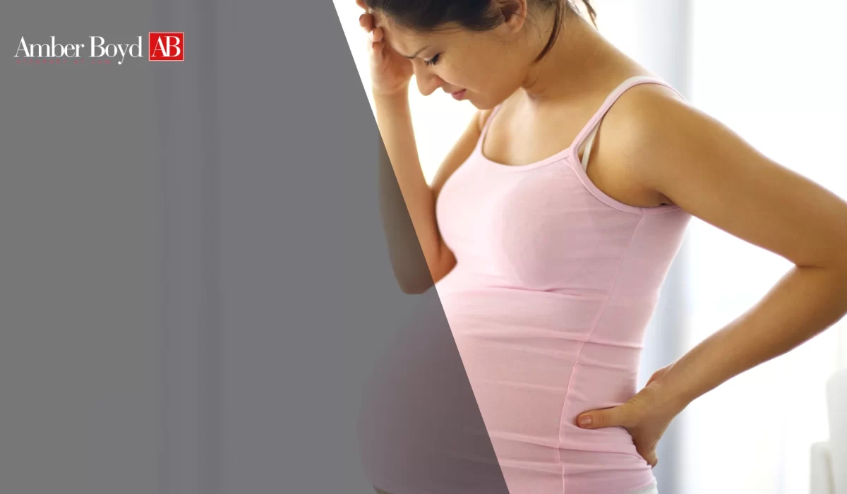 Indiana pregnancy discrimination attorney consulting with pregnant employee on workplace rights and accommodation
