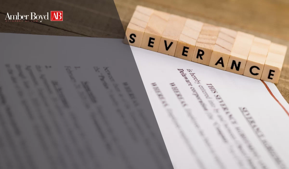 Indiana severance negotiation attorney reviewing settlement agreement with departing employee
